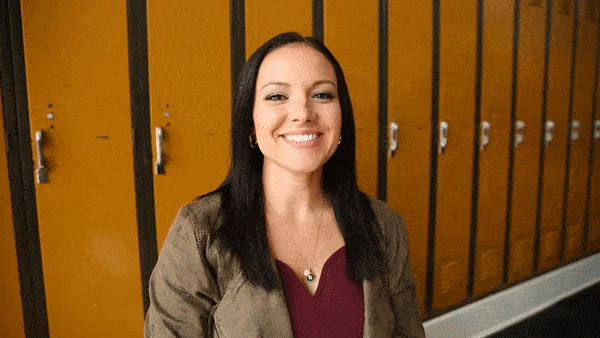 Jade from Lemonly giving a friendly smile and handshake