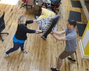 Lemonly interns in a pillow battle