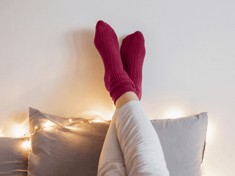 Legs resting on pillow